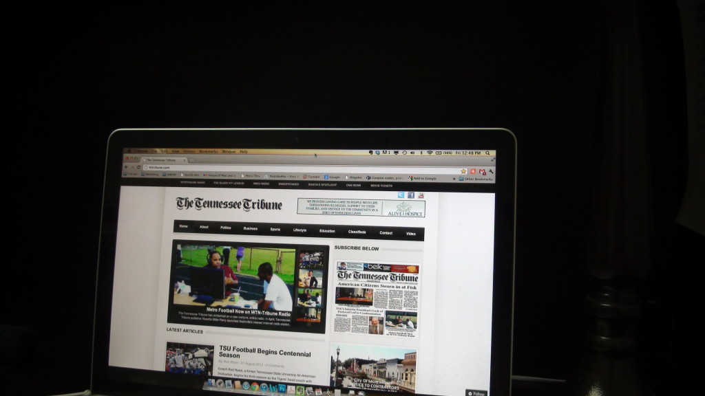 A staff member of The Tennessee Tribune opens his web browser to www.tntribune.com (Photo By: Jason Luntz/Full Sail) 